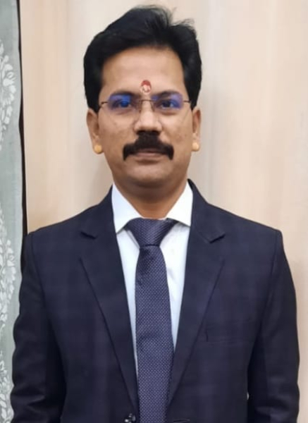 Dr. Karun Sharma
